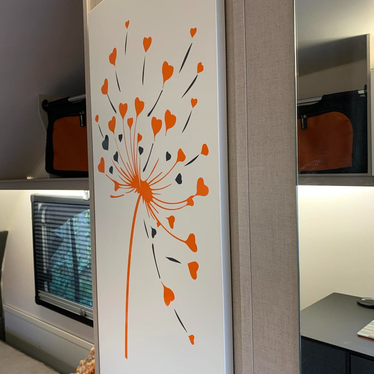 Decorative wall panel with orange floral dandelion design