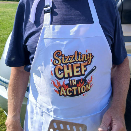 Fun White Or Black Apron with Silly message on the Front  “Sizzling Chef In Action” (Various Options)